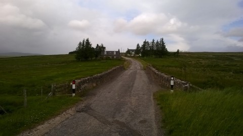 Crask Inn (right) and the bunkhouse cottage