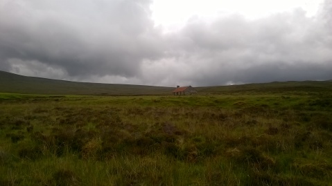 The old bothy at Garbhairaidh, with Clach Goil on the skyline immediately to its left